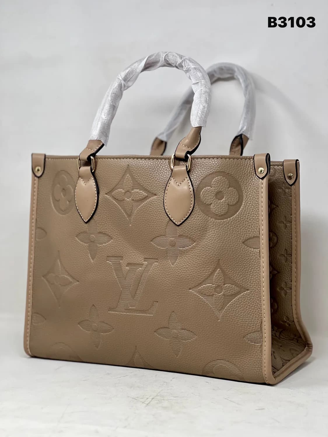 Embossed Monogram Tote in Taupe