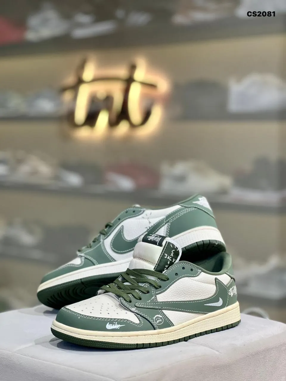 Olive and cream low-top sneakers